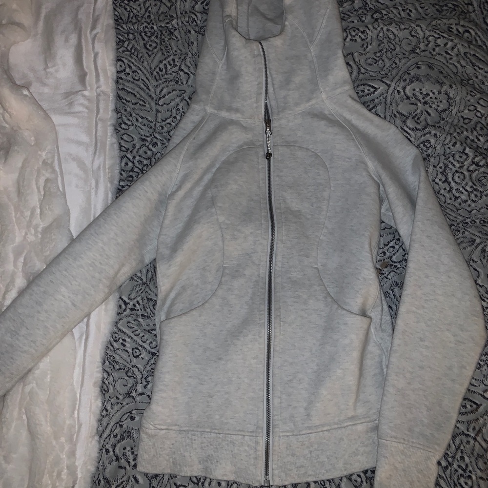 Lulu lemon jacket w a hood.